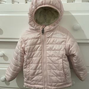 Two sides coat from North face,lite pink and cream fuzzy side